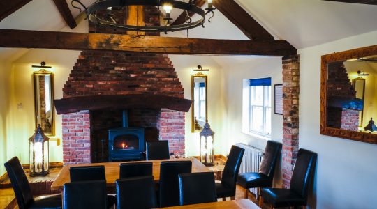 Dining room with log burner